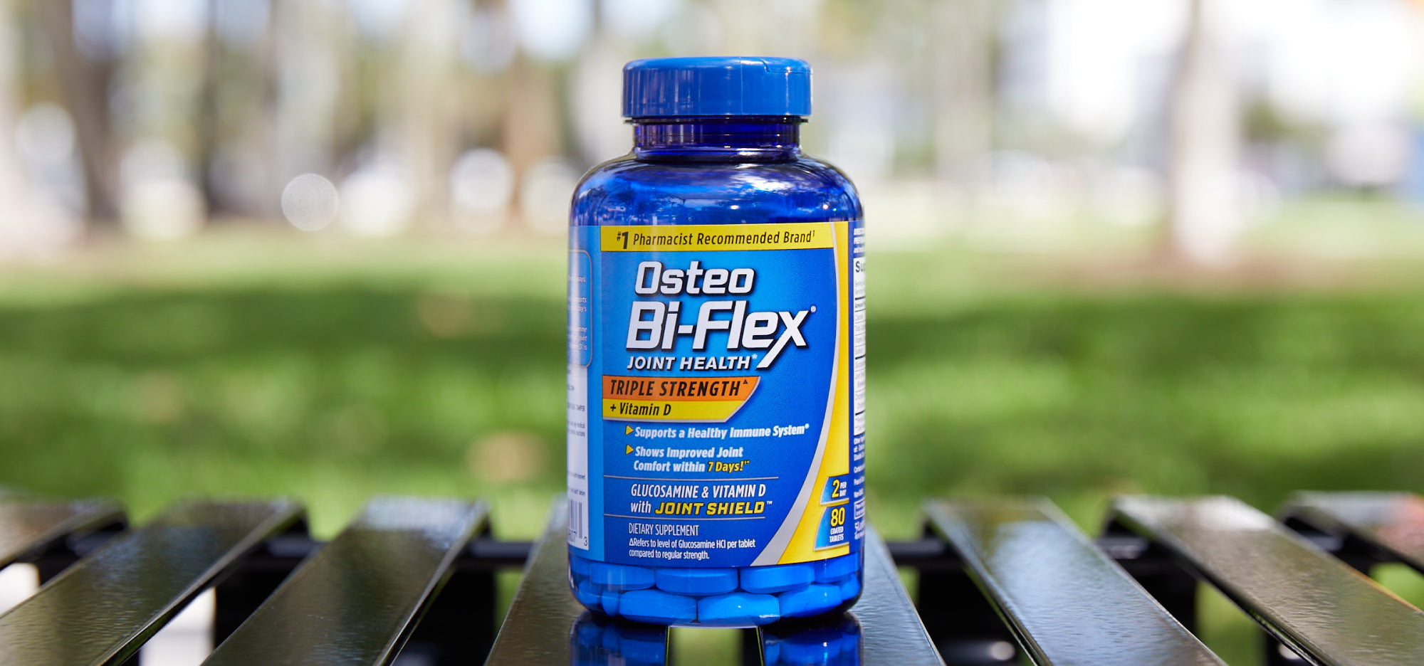 Osteo Bi-Flex Joint Health* Triple Strength + Vitamin D Product, pictured in an outdoor setting